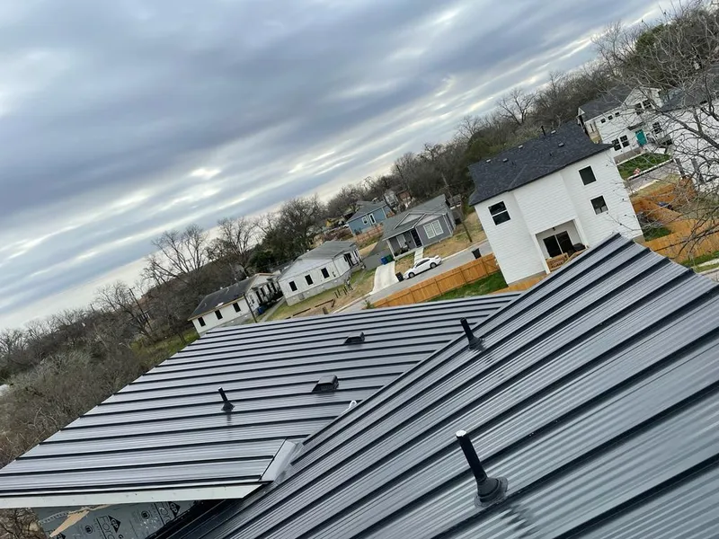 Standing seam metal roof panels with vents for Skylight Repair in Duluth
